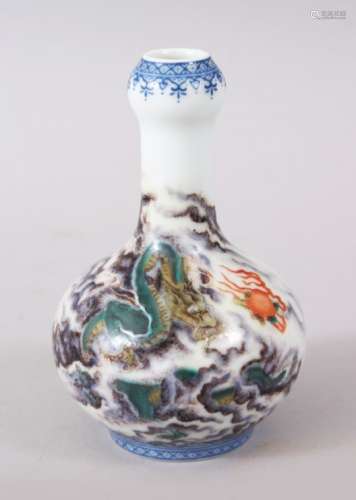 A GOOD CHINESE FAMILLE ROSE PORCELAIN DRAGON BOTTLE VASE, the body with scenes of dragons amongst