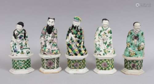 FIVE 19TH CENTURY CHINESE FAMILLE VERTE PORCELAIN FIGURES, depicting native men and women officials,