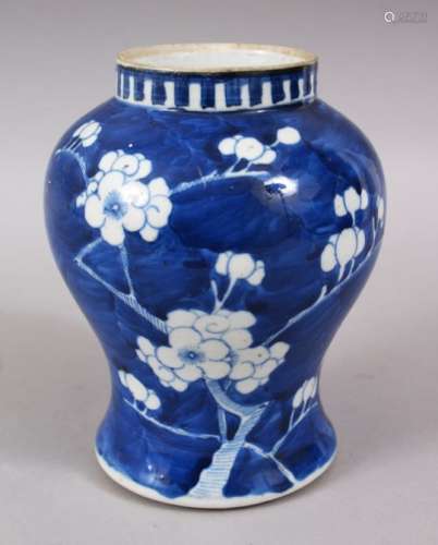 A 19TH CENTURY CHINESE BLUE & WHITE PORCELAIN PRUNUS JAR, 16cm high x 12.5cm wide.