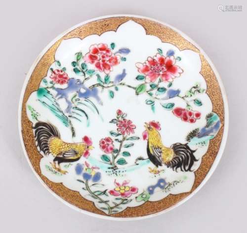 AN 18TH CENTURY CHINESE FAMILLE ROSE PORCELAIN SAUCER, painted to depict birds amongst flora, 11.