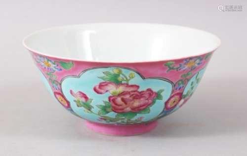 A CHINESE PINK GROUND FAMILLE ROSE PORCELAIN BOWL, the body decorated upon a pink ground with panels