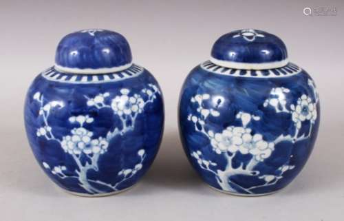 A GOOD PAIR OF 19TH / 20TH CENTURY CHINESE BLUE & WHITE PORCELAIN PRUNUS GINGER JARS & COVERS,