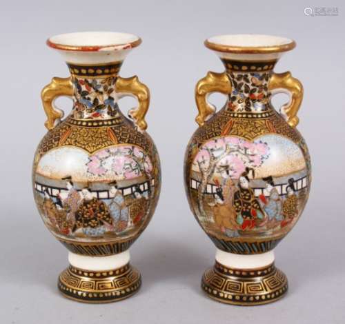 A SMALL PAIR OF JAPANESE MEIJI PERIOD SATSUMA VASES, both decorated in a similar way, with two