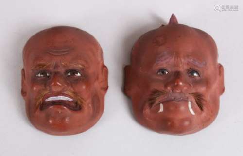 TWO JAPANESE MEIJI PERIOD CARVED PAPER MACHE / LACQUER NOH MASKS, with inlaid eyes, 6.5cm each.