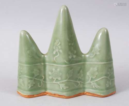 A GOOD CHINESE CELADON LONGQUAN GROUND MOULDED BRUSH STAND / REST, with moulded decoration of