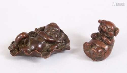 TWO SMALL CHINESE BRONZE FIGURES - PIG & BOY ON LOTUS LEAF, both with seal marks impressed, 6.