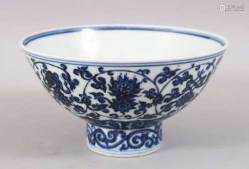 A GOOD CHINESE MING STYLE PORCELAIN STEM BOWL, decorated with formal scrolling flora, the interior