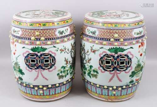 A GOOD PAIR OF 19TH CENTURY CHINESE FAMILLE ROSE PORCELAIN GARDEN BARREL SEATS, the body with