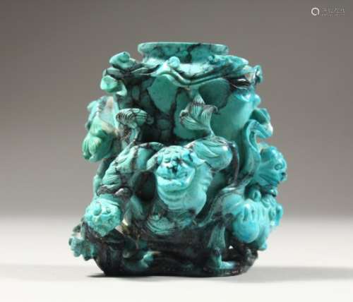 A GOOD CHINESE CARVED TURQUOISE STONE SNUFF BOTTLE / POT; the body of the bottle carved in relief