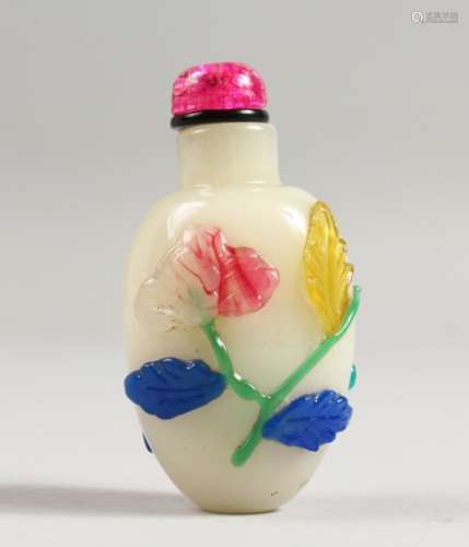 A CHINESE OVERLAY SNUFF BOTTLE with flowers.