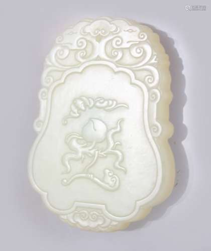 A GOOD PALE JADE CARVED PENDANT, with carved decoration of calligraphy and foliage, 5cm x 4cm.