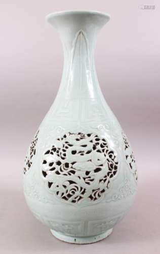 A GOOD CHINESE CLAIR DE LUNE PIERCED PORCELAIN VASE, the body with reticulated panels of dragons,