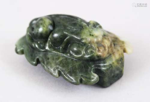 A GOOD 19TH / 20TH CENTURY CHINESE CARVED JADE BELT DECORATION OF A KYLIN, 6CM X 4.5CM