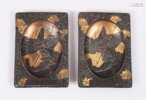 A PAIR OF JAPANESE LATE MEIJI MIXED METAL SAMURAI DISHES, this pair of dishes with scenes of two