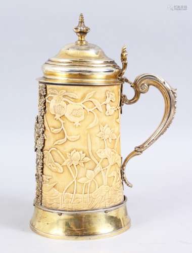 A LOVELY 19TH CENTURY GILT SILVER MOUNTED CHINESE STYLE CARVED IVORY TUSK SECTION TANKARD, The