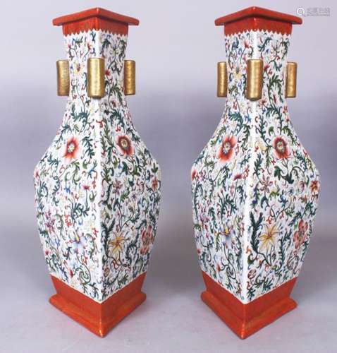 AN UNUSUAL PAIR OF GOOD QUALITY CHINESE FAMILLE ROSE TRIANGULAR SECTION PORCELAIN ARROW VASES, the