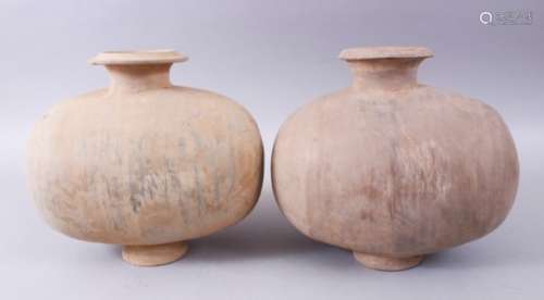 A PAIR OF UNUSUAL EARLY CHINESE BARREL SHAPED TERRACOTTA VESSEL, with broad circular neck and
