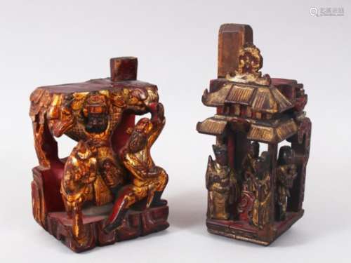 TWO 19TH CENTURY CHINESE GILT WOOD CARVINGS / SEALS, both carved with figures within temples, one