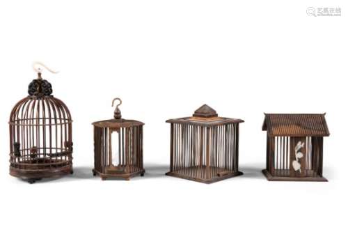 A COLLECTION OF FOUR HARDWOOD CRICKET CAGES. The largest 19cm high