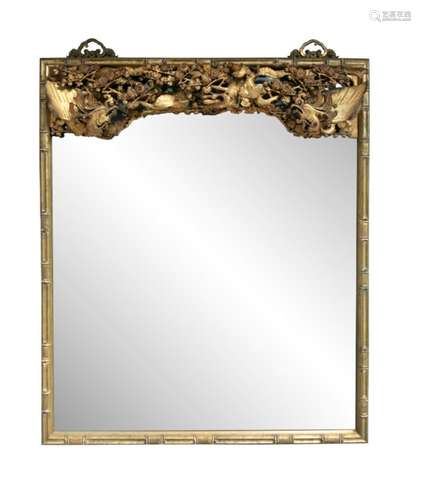 A CHINESE CARVED GILTWOOD WALL MIRROR, mid-20th century, of rectangular form, with stylised bamboo