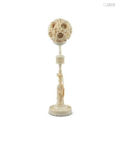 A LARGE CHINESE CARVED IVORY PUZZLE BALL ON STAND, c.19th century, the detachable sphere carved with