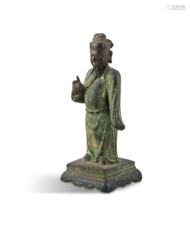 A CHINESE BRONZE FIGURE OF AN IMMORTAL, Ming Dynasty (1368 - 1644), with gilt traces, in standing