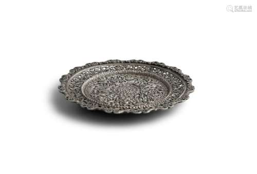 A COLONIAL INDIAN SILVER REPOUSSÉ SALVER, probably Kutch, stamped MM, decorated with continuous