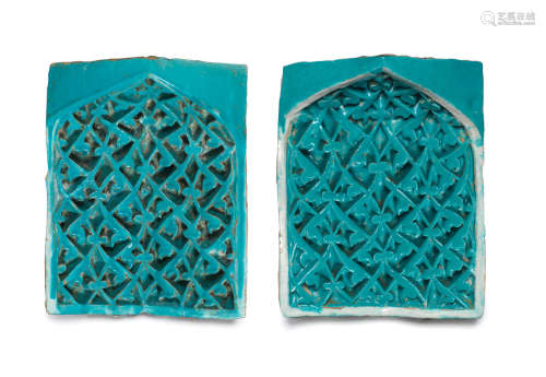 (2) A pair of Timurid moulded pottery squinch tiles (muqarnas) Persia, second half of the 14th Century