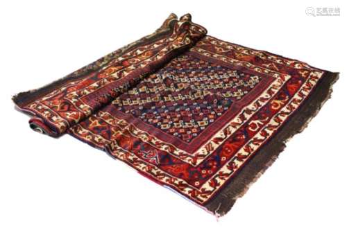 A GOOD CAUCASIAN CARPET with a centre with numerous designs within a four row border. 12ft x 4ft