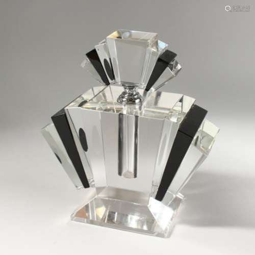 A LARGE CLEAR AND BLACK GLASS ART DECO STYLE SCENT BOTTLE. 9ins high.