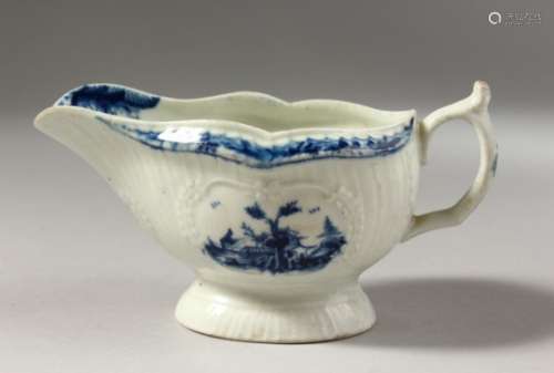 A SMALL SIZED WORCESTER BLUE AND WHITE SAUCEBOAT, with slightly curved vertical moulding painted