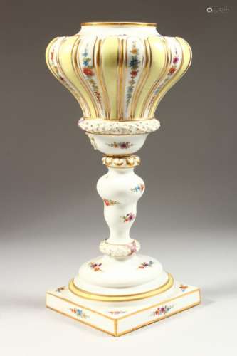 A LARGE 19TH CENTURY MEISSEN PORCELAIN LAMP BASE, sprigged with flowers, on a square base. Cross