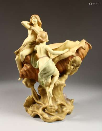 A ROYAL DUX STYLE SHELL VASE with two young girls. 15ins high.