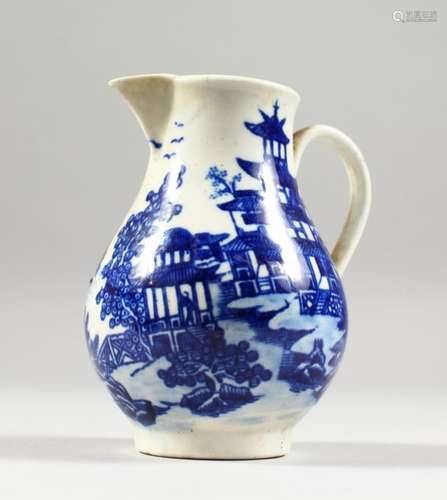 A WILLOW PATTERN DESIGN SPARROW BEAK JUG. 3.5ins high.