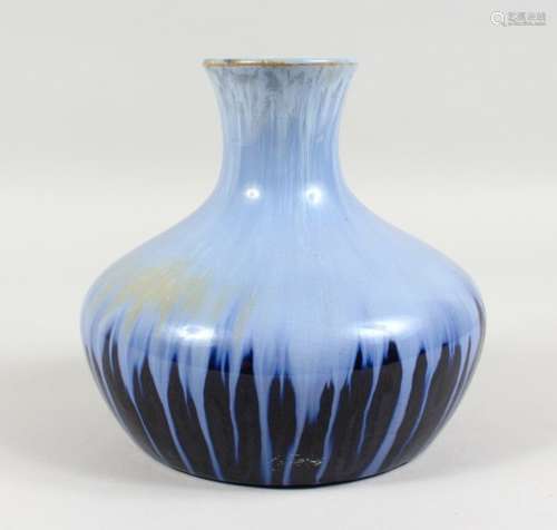 ASHBY GOULD, A PALE AND DARK BLUE SLIP GLAZED BULBOUS VASE, impressed mark to base. 7ins high.