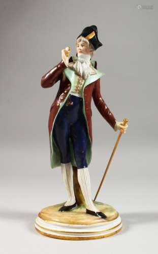 A MEISSEN FIGURE OF A DANDY, standing wearing a tailcoat, a stick in his left hand, a monocle in his
