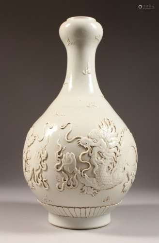 A BLANC DE CHINE GARLIC NECK VASE, with moulded dragon decoration. 15ins high.