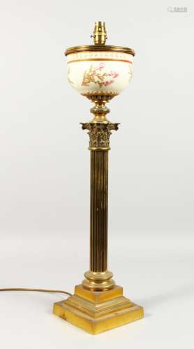 A GOOD BRASS CORINTHIAN COLUMN TABLE LAMP, possibly converted from an oil lamp, with Royal Worcester