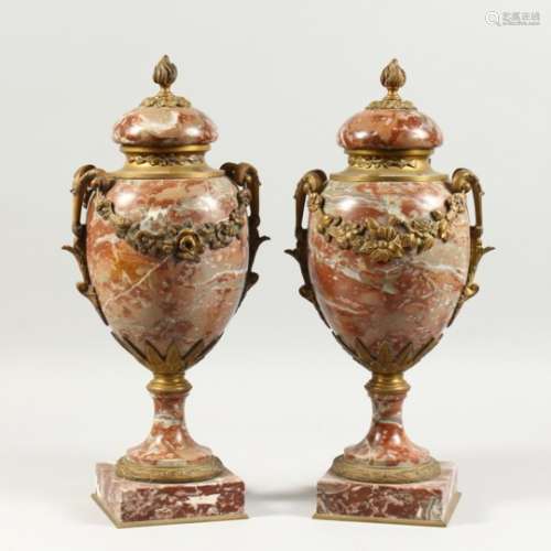 A VERY GOOD PAIR OF FRENCH MARBLE CASSOLETTES AND COVERS with ornate handles and garlands. 1ft