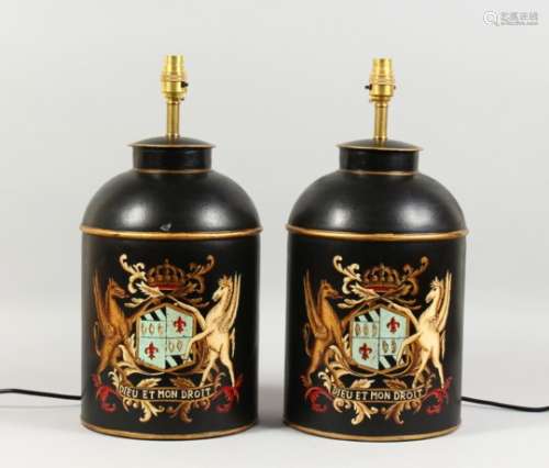 A PAIR OF TOLEWARE LAMPS, modelled as tea canisters. 18ins high.