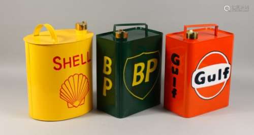 THREE REPRODUCTION OIL CANS. 12ins high.