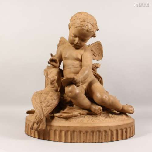 A GOOD LARGE 19TH CENTURY PAINTED TERRACOTTA CLASSICAL GROUP; Cupid, a book in his hand and a dove