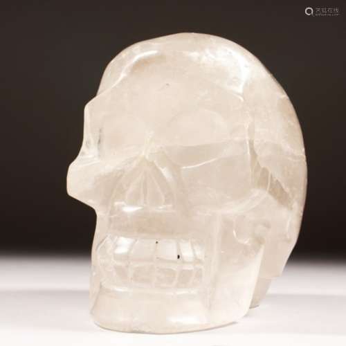 A LARGE CRYSTAL SKULL. 7ins high.