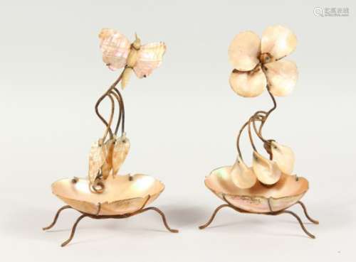 TWO MOTHER-OF-PEARL SHELL STANDS. 8ins high.