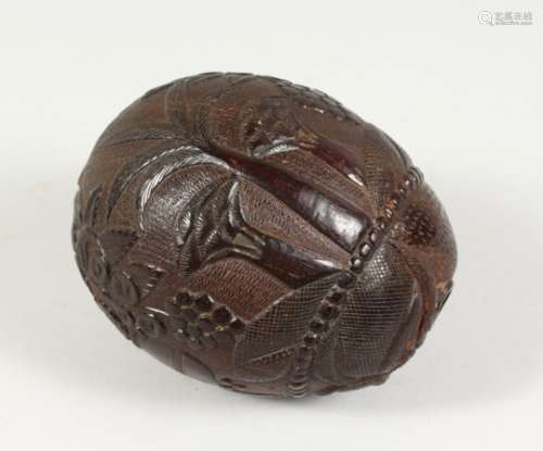 A CARVED NUT 