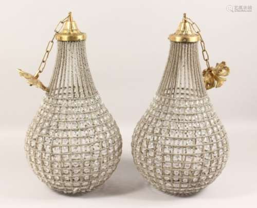 A PAIR OF BRASS AND CUT GLASS BALLOON SHAPE CEILING LIGHTS. 22ins high.