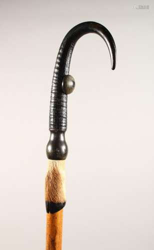 AN ALPINE WALKING STICK, with hoof handle. 39ins long.