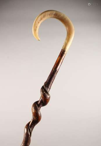 A HORN HANDLED SHEPHERD'S CROOK, with barley twist shaft. 48ins long.