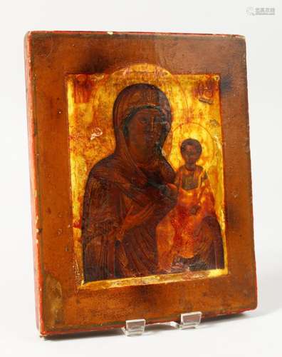 AN 18TH CENTURY ICON, Madonna and Child, on panel. 7ins x 5.5ins.