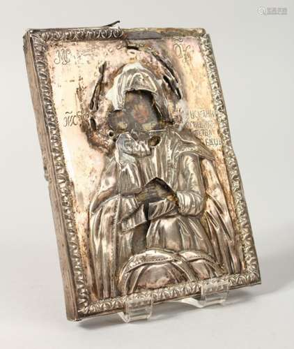 A SMALL 18TH CENTURY RUSSIAN ICON, with silver cover. 4.5ins x 3.5ins.